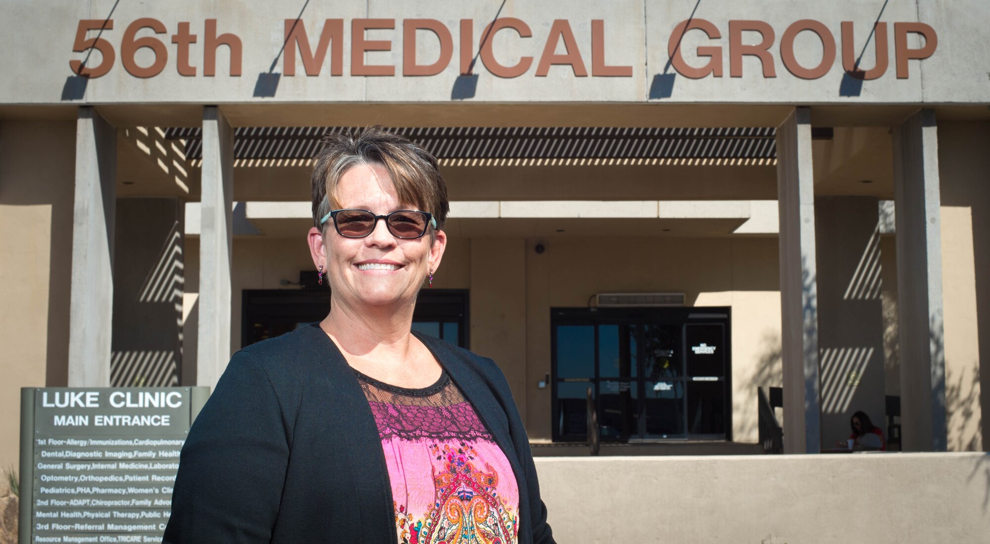 Melissa Kunkel, 56th Dental Squadron expanded function dental assistant, stands in front of the 56th Medical Group at Luke Air Force Base, Ariz., Sept 27, 2017. Kunkel earned the Air Force Medical Service’s August “Trusted Care Hero” award for a discovery she made in the dental squadron. (U.S. Air Force photo/SSgt Jensen Stidham)
