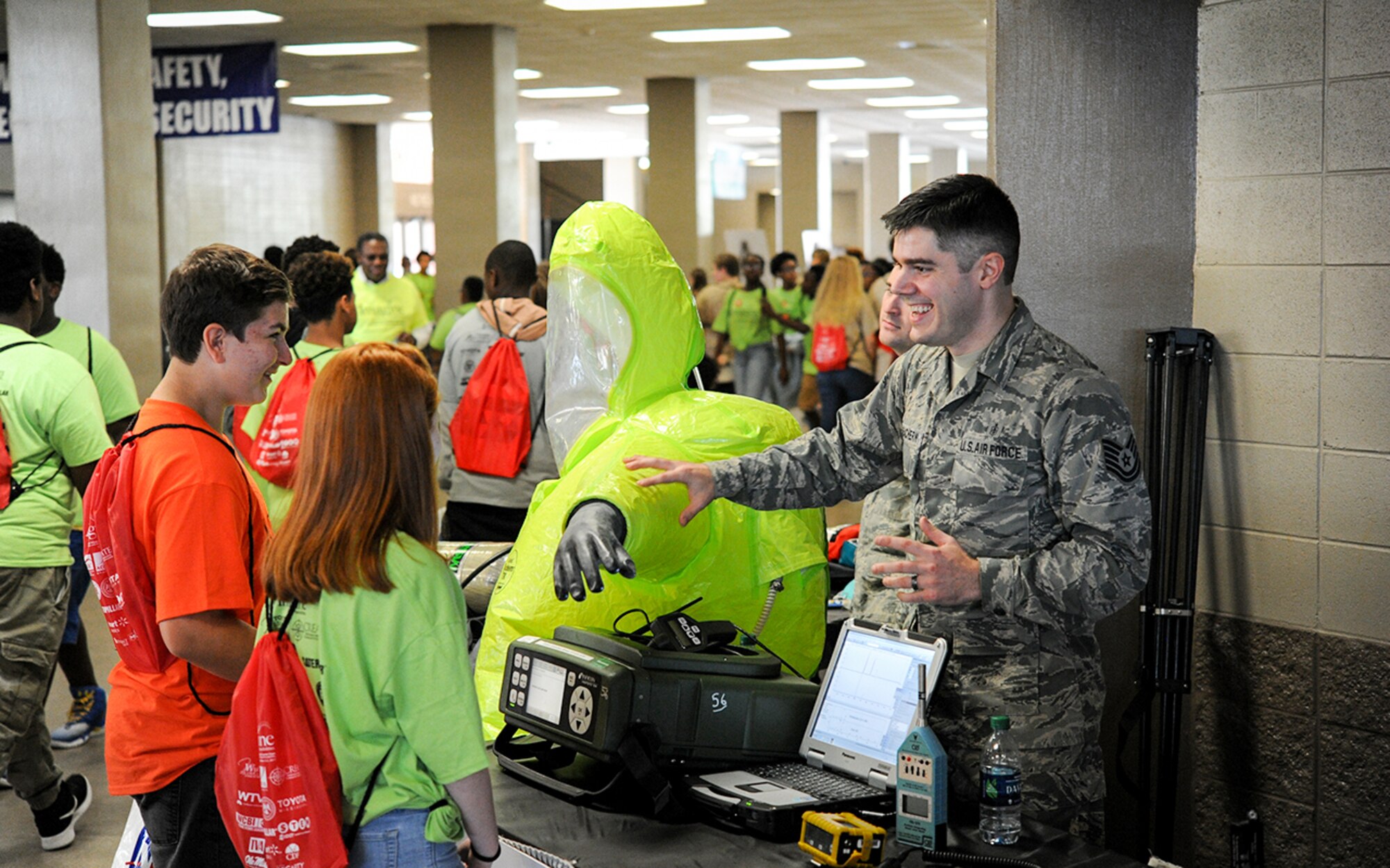 Tech. Sgt. George MacEachrern, 14th Medical Operations Squadron bioenvironmental engineer technician, shows students hazardous materials response equipment Oct. 3, 2017, during the Imagine the Possibilities Career Expo at the BancorpSouth Arena in Tupelo, Mississippi. Airmen from 14th MDOS showed some of the various careers that are available in the health field. (U.S. Air Force photo by Staff Sgt. Christopher Gross)