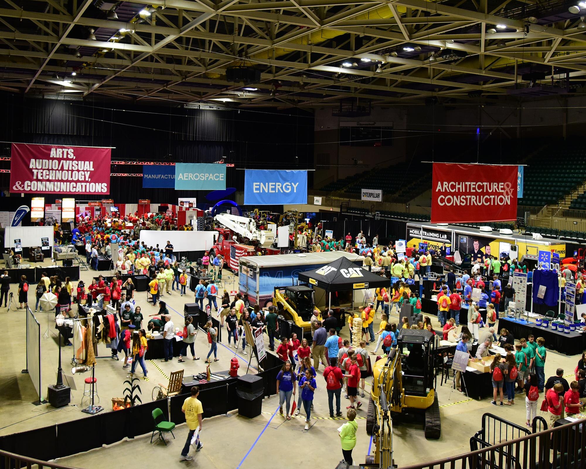 Students explore multiple career booths Oct. 4, 2017, during the Imagine the Possibilities Career Expo at the BancorpSouth Arena in Tupelo, Mississippi. The three-day expo was hosted by the CREATE Foundation and was sponsored by more than 150 organizations to inspire local eighth-grade students. (U.S. Air Force photo by Elizabeth Owens)