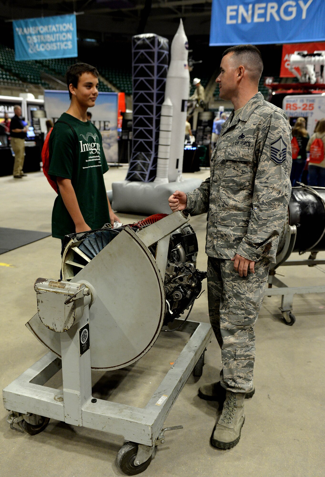 Master Sgt. Jimmy Kitchens, 14th Flying Training Wing contracting officer representative, speaks with a student about the maintenance career field options Oct. 4, 2017, during the Imagine the Possibilities Career Expo at the BancorpSouth Arena in Tupelo, Mississippi. The Air Force offers many different paths within single careers, from crew chief to aerospace propulsion, that all push the mission toward success. (U.S. Air Force photo by Airman 1st Class Keith Holcomb)
