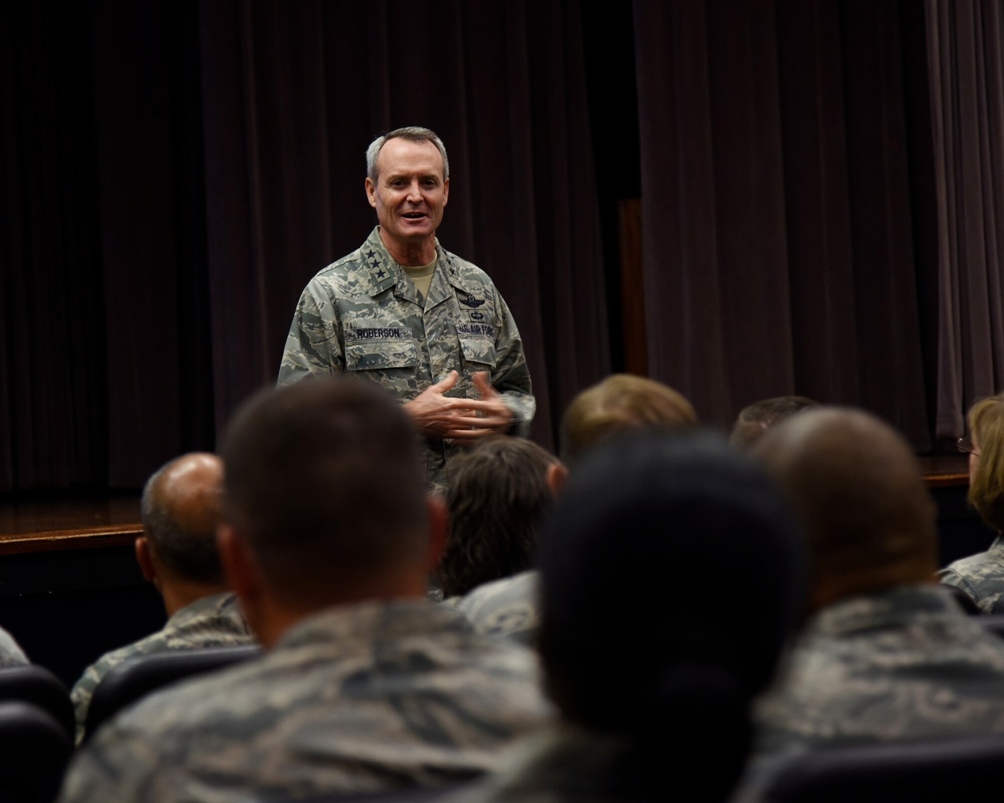 Lt. Gen. Darryl L. Roberson, commander of Air Education and Training Command, speaks with 14th Flying Training Wing leadership during an AETC Senior Leader All-Call Oct. 5, 2017, on Columbus Air Force Base, Mississippi. Roberson and AETC Command Chief Master Sergeant Juliet C. Gudgel spoke about future changes and ideas that can be implemented throughout their bases, groups and squadrons to more efficiently lead their students and Airmen.