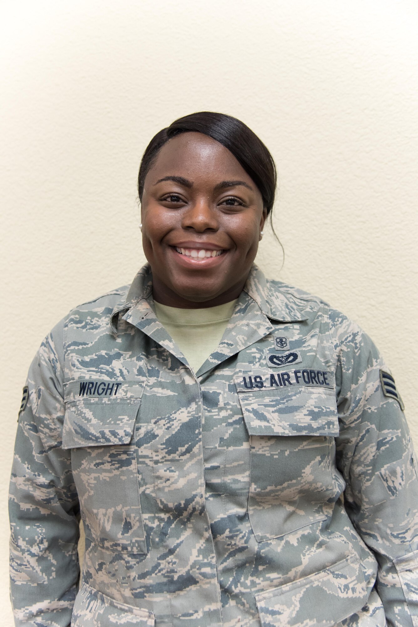 Senior Airman Tamara Wright, 403rd Aeromedical Staging Squadron health services management apprentice, poses for a photo after being presented with a certificate of appreciation Sept. 10, 2017 at Keesler Air Force Base, Mississippi. (U.S. Air Force photo/Staff Sgt. Heather Heiney)