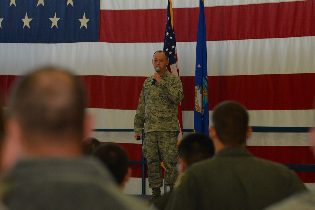 Col. John Edwards, the 28th Bomb Wing commander, speaks to the wing about squadron revitalization during an all-call in the Pride Hangar at Ellsworth Air Force Base, S.D., Oct. 13, 2017. The 34th and 37th Bomb Squadrons were recently awarded four contractors to assist with scheduling and other duties to help with operational efficiency. (U.S Air Force photo by Airman Nicolas Z. Erwin)