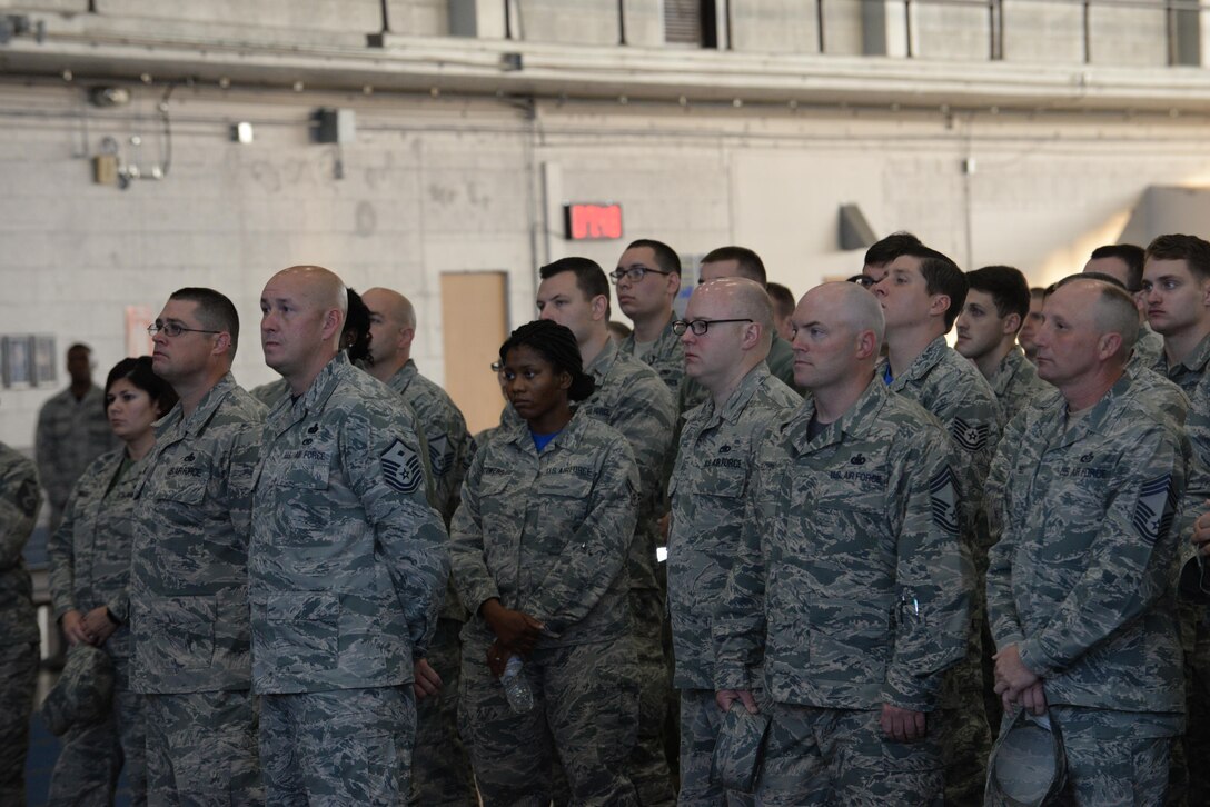 Airmen listen to the feedback Col. John Edwards, 28th Bomb Wing commander, received during the Air Force Global Strike Senior Leader Conference during a wing all-call in the Pride Hangar at Ellsworth Air Force Base, S.D., Oct. 13, 2017. The senior leaders of AFGSC complemented the work ethic and determination that the base Airmen put forth for both AFGSC and U.S. Pacific Command. (U.S. Air Force photo by Airman Nicolas Z. Erwin)