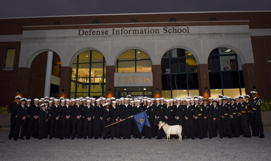 DINFOS staff and students pose with a goat, Oct. 17, 2017.