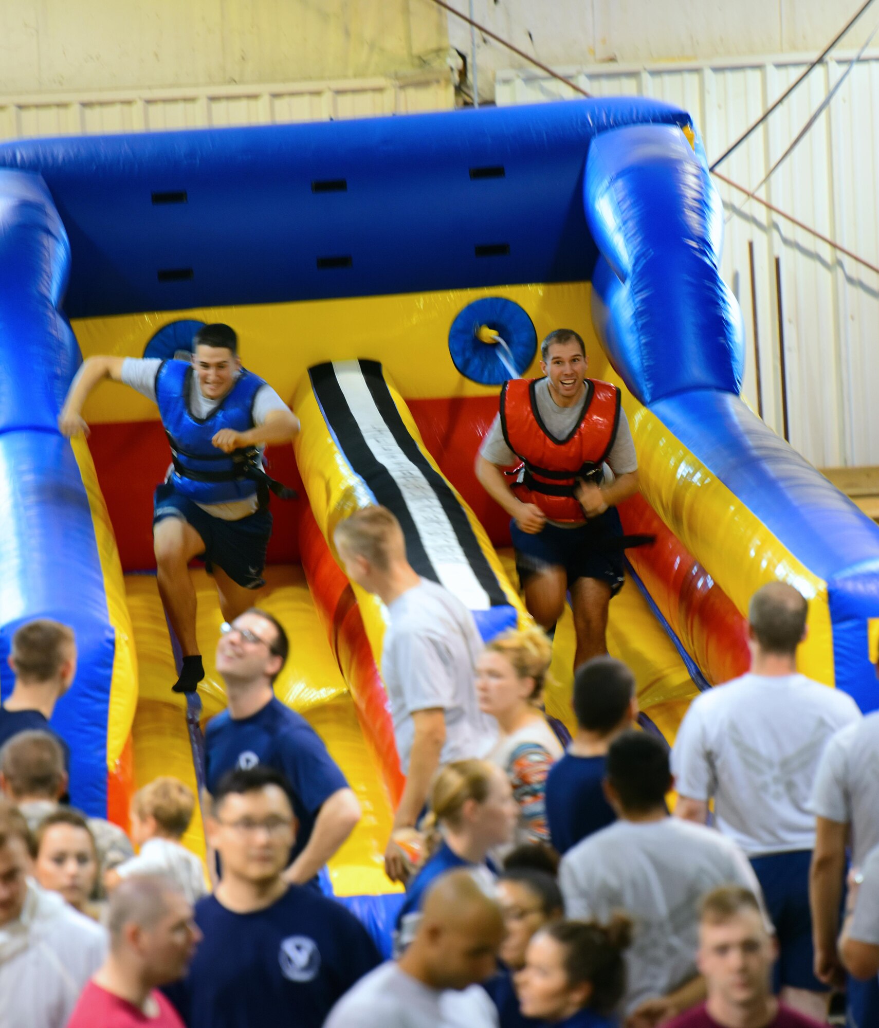 Members of Team Whiteman participate in a bungee run competition prior to the culmination ceremony for the 2017 Comprehensive Airman Fitness Day at Whiteman Air Force Base, Mo., Oct. 6, 2017.