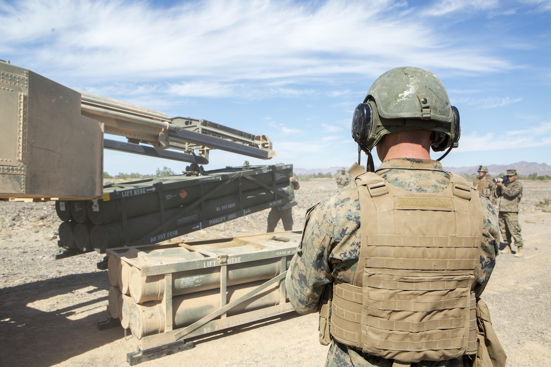 Lance Cpl. Justin Minor, a gunner with 3rd Platoon, Rocket Battery F, 2nd Battalion, 14th Marine Regiment, 4th Marine Division, Marine Forces Reserve, operates a High Mobility Artillery Rocket System's hydraulic control system during the loading of an M31 Guided Multiple Launch Rocket System m, during Weapons and Tactics Instructor course 1-18 at Landing Zone Bull Attack, near the Chocolate Mountain Aerial Gunnery Range, California, Oct. 11, 2017. With possession of one of two HIMARS in the Marine Corps, 2/14 is highly interoperable with the active component and provides an essential shock absorber during exercises and deployments.