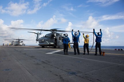 U.S. Marines with Marine Medium Tiltrotor Squadron (VMM) 162 (Reinforced), 26th Marine Expeditionary Unit (MEU), prepare to disembark the amphibious assault ship USS Kearsarge (LHD 3) via CH-53E Super Stallion helicopters also with VMM 162 (REIN), in the Caribbean Sea, Oct. 12, 2017.