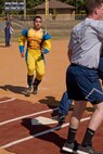 U.S. Air Force Senior Airman Nathaniel “Wolverine” Adams, an aerospace ground equipment journeyman assigned to the 19th Maintenance Squadron, prepares to score during a kickball game against the 19th Logistics Readiness Squadron at Team Little Rock’s annual Sports Day on Little Rock Air Force Base, Ark., Oct. 13, 2017.