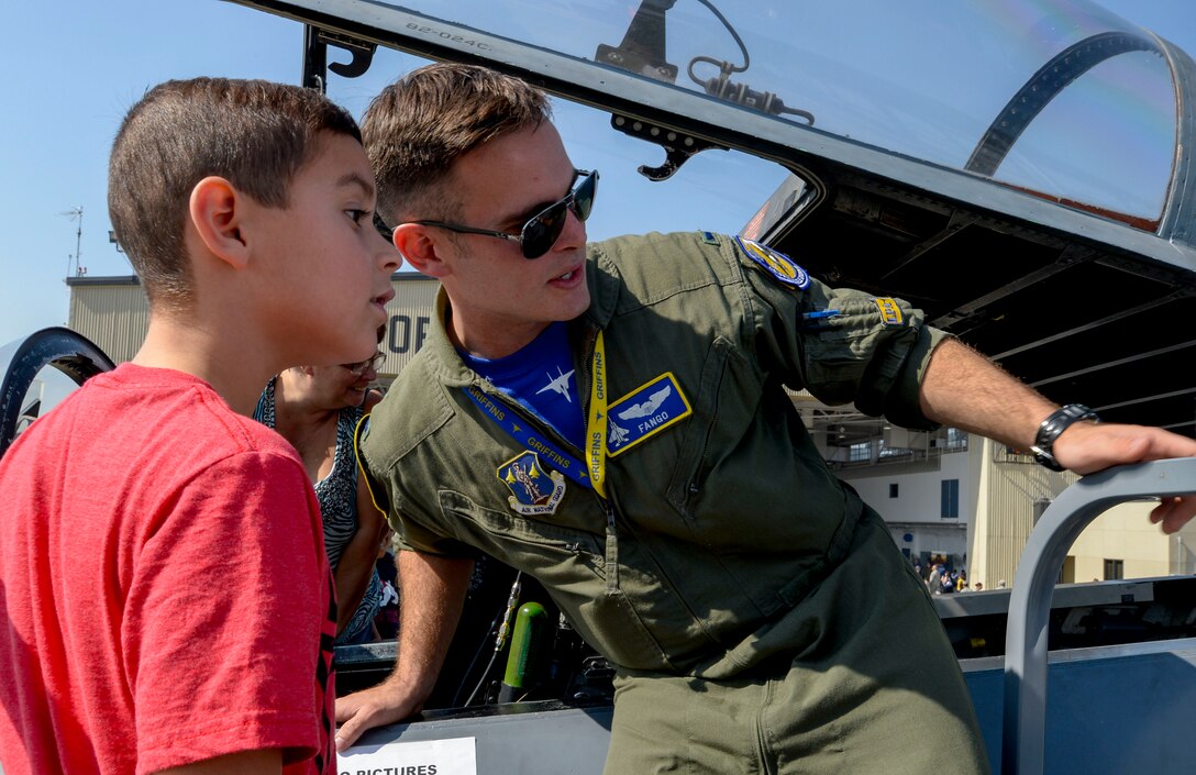 U.S. Air Force 1st Lt. Thomas Fitzgerald, 144th Fighter Wing pilot, explains how the F-15C Eagle fighter jet operates.