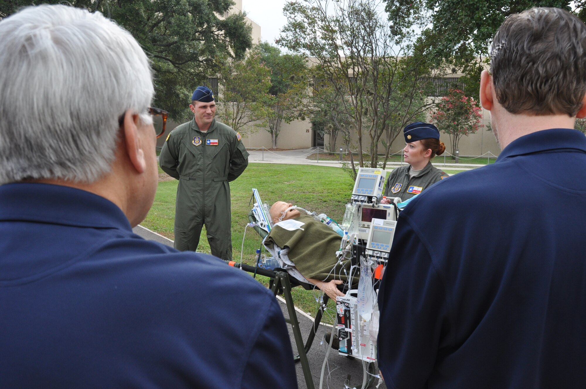 Maj. Dana Meyer, 433rd Aeromedical Staging Squadron Critical Care Air Transport Team, briefs the 433rd Airlift Wing honorary commanders on her team’s responsibilities and capabilities during a tour of the 433rd Medical Group Oct. 14, 2017.  The honorary commanders received their first look at the new Wilford Hall Ambulatory Surgical Center which opened in June 2017. (U.S. Air Force photo/Senior Airman Bryan Swink)