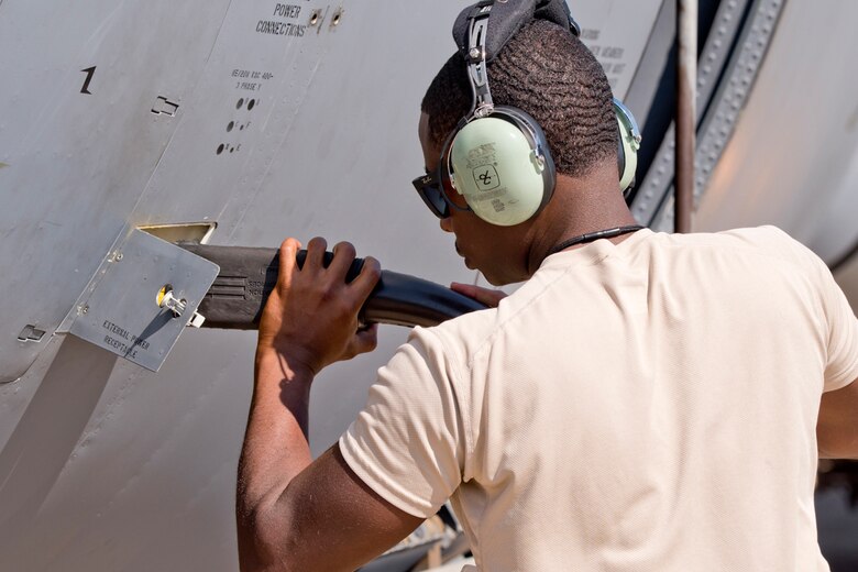 U.S. Air Force Reserve Staff Sgt. Kquawmae Akins, crew chief, 913th Maintenance Squadron, connects external power to a C-130J Super Hercules Oct. 14, 2017, at Little Rock Air Force Base, Ark.