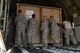 Airmen of the 157th Air Refueling Wing load a Disaster Relief Beddown Set onto the back of a Lockheed C-130 Hercules on October 15, 2017, at Pease Air National Guard Base, N.H. The DRBS is a system of tents and amenities which will be transported to Puerto Rico to support relief workers in the aftermath of Hurricane Maria. (N.H. Air National Guard photo by Staff Sgt. Kayla Rorick)