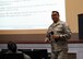 Master Sgt. Carlos Recoder, a military training instructor assigned to the 433rd Training Squadron, briefs members of the 446th Airlift Wing during the wing commanders call Oct. 15, 2017 at McChord Field, Wash.