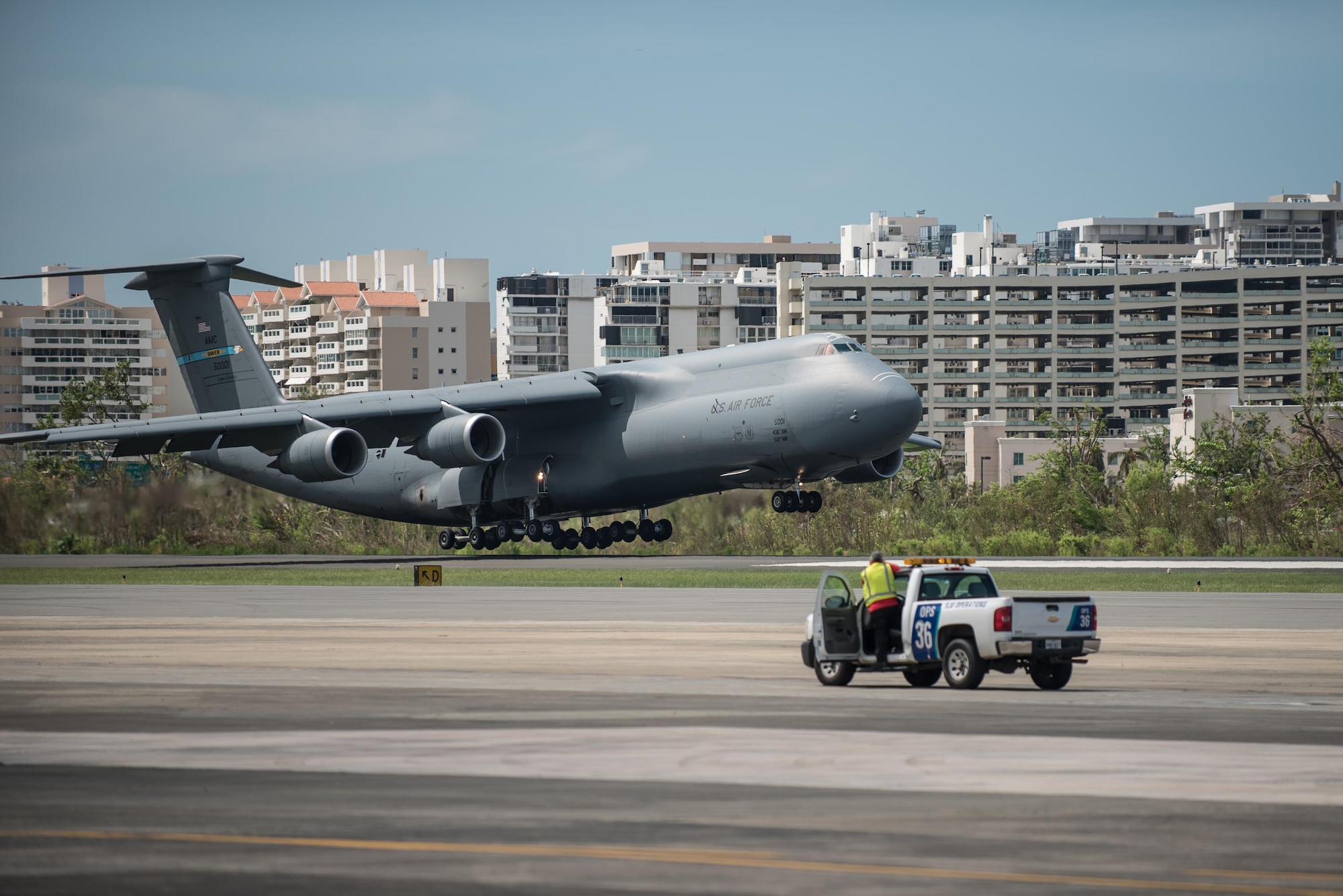 A U.S. Air Force C-5 Galaxy loaded with humanitarian aid lands at Luis Muñoz Marín International Airport in San Juan on Oct. 5, 2017. The cargo will be downloaded and staged for distribution by Airmen from the Kentucky Air Guard’s 123rd Contingency Response Group as part of Hurricane Maria recovery efforts. (U.S. Air National Guard photo by Lt. Col. Dale Greer)