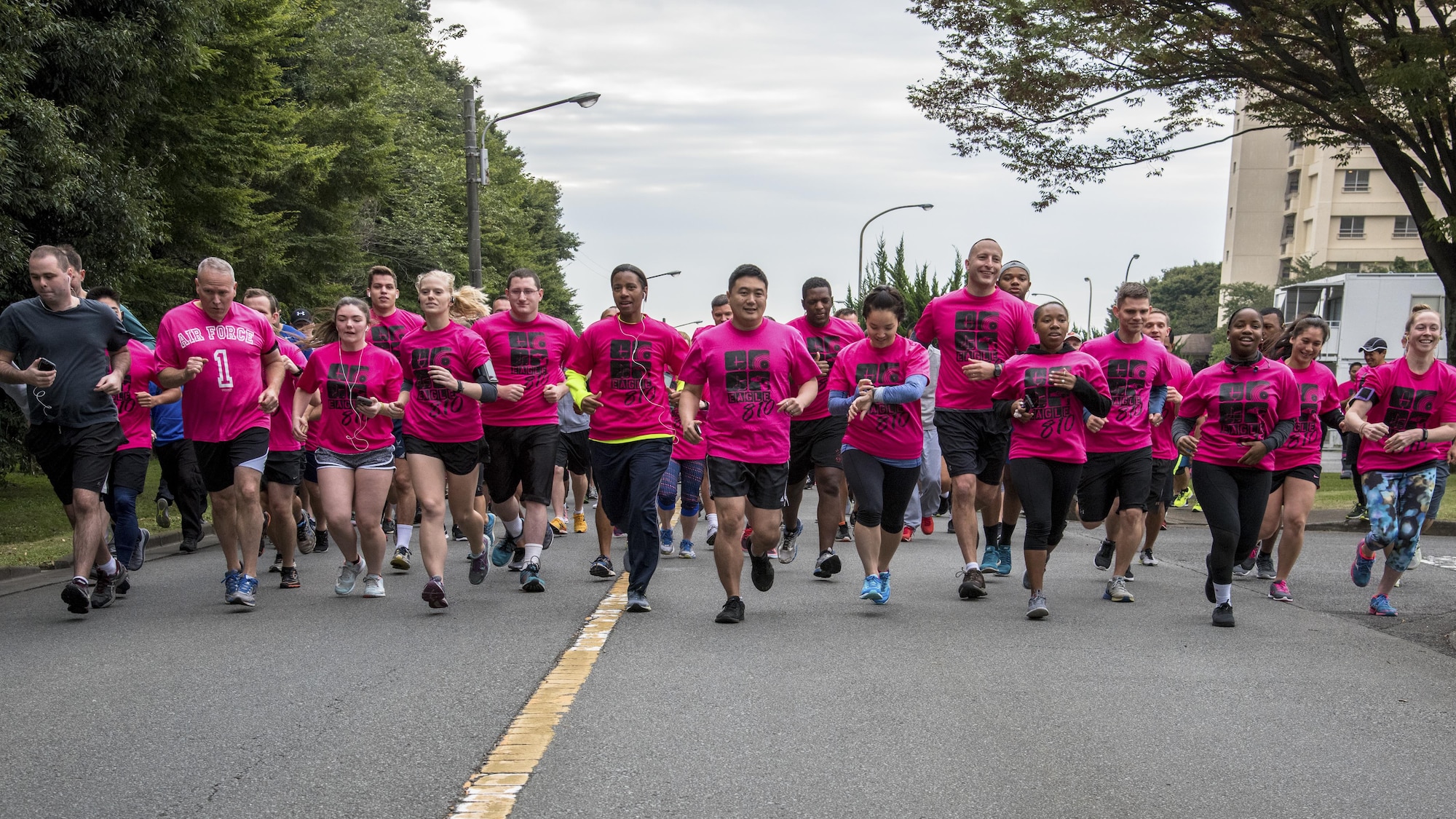 Participants begin the Breast Cancer Awareness Month 5K run at Yokota Air Base, Japan, Oct. 06, 2017.