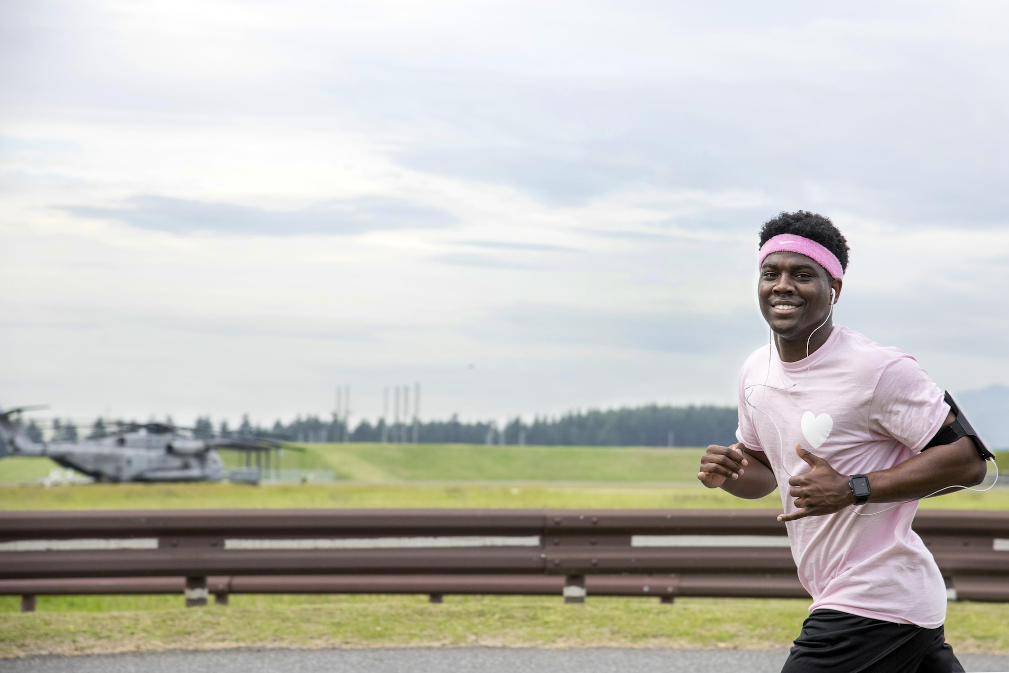 A participant runs during the Breast Cancer Awareness Month 5K run at Yokota Air Base, Japan, Oct. 06, 2017.