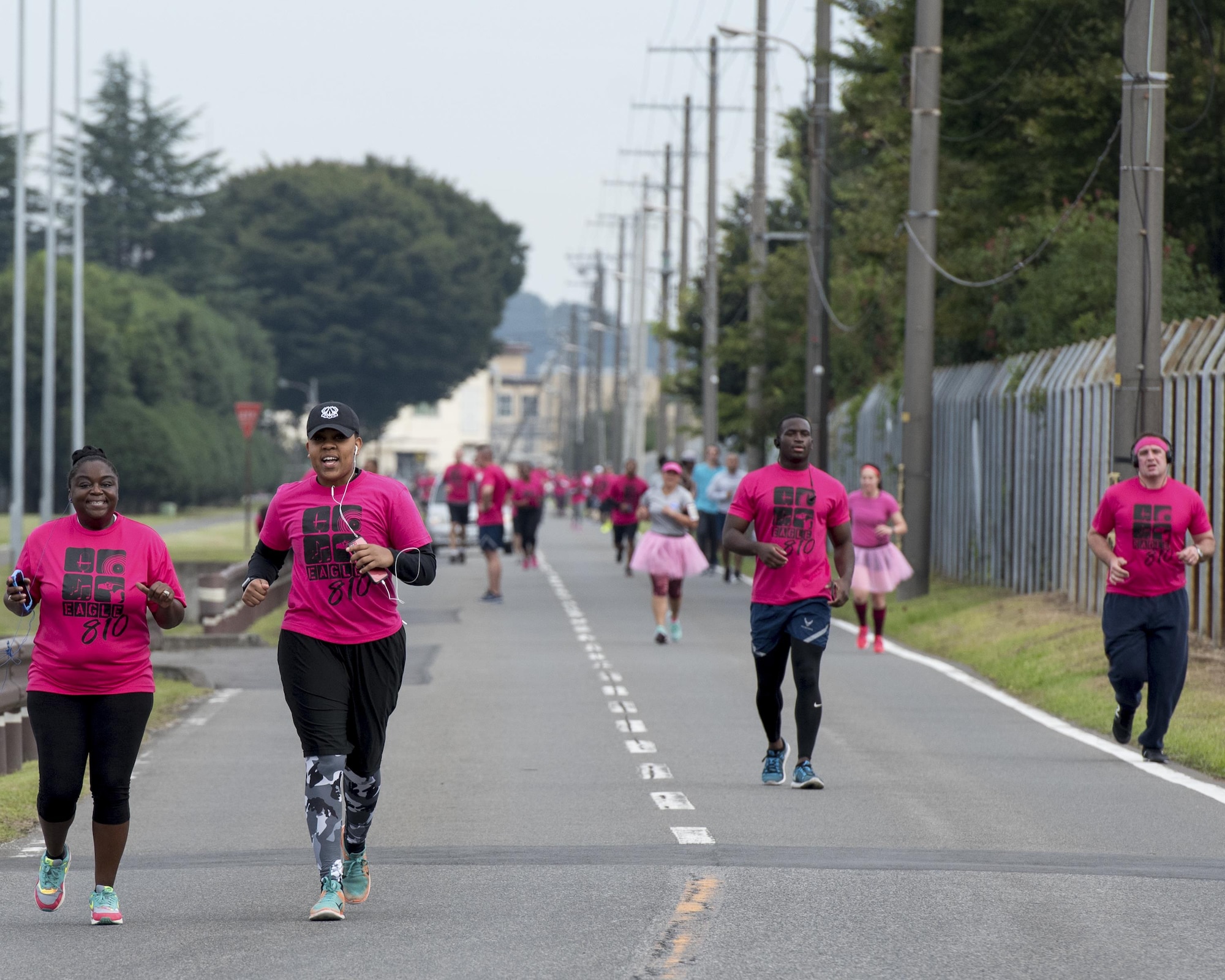Participants run during the Breast Cancer Awareness Month 5K run at Yokota Air Base, Japan, Oct. 06, 2017.