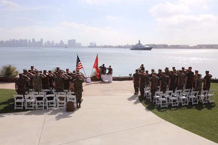 Marines with 9th Marine Corps District, based out of Naval Station Great Lakes, Illinois, salute during the national anthem during a ceremony in San Diego, Calif., Oct. 11. The Marine recruiters in attendance were recognized for their efforts during a two-month recruiting offensive, Operation Herculean Effort, where they went above and beyond to find the most highly qualified men and women to join the Marine Corps, from across the Midwest. Marines received awards such as the Navy and Marine Corps Commendation and the Navy and Marine Corps Achievement Medals.  (U.S. Marine Corps photo by Lance Cpl. Quavaungh Pointer)