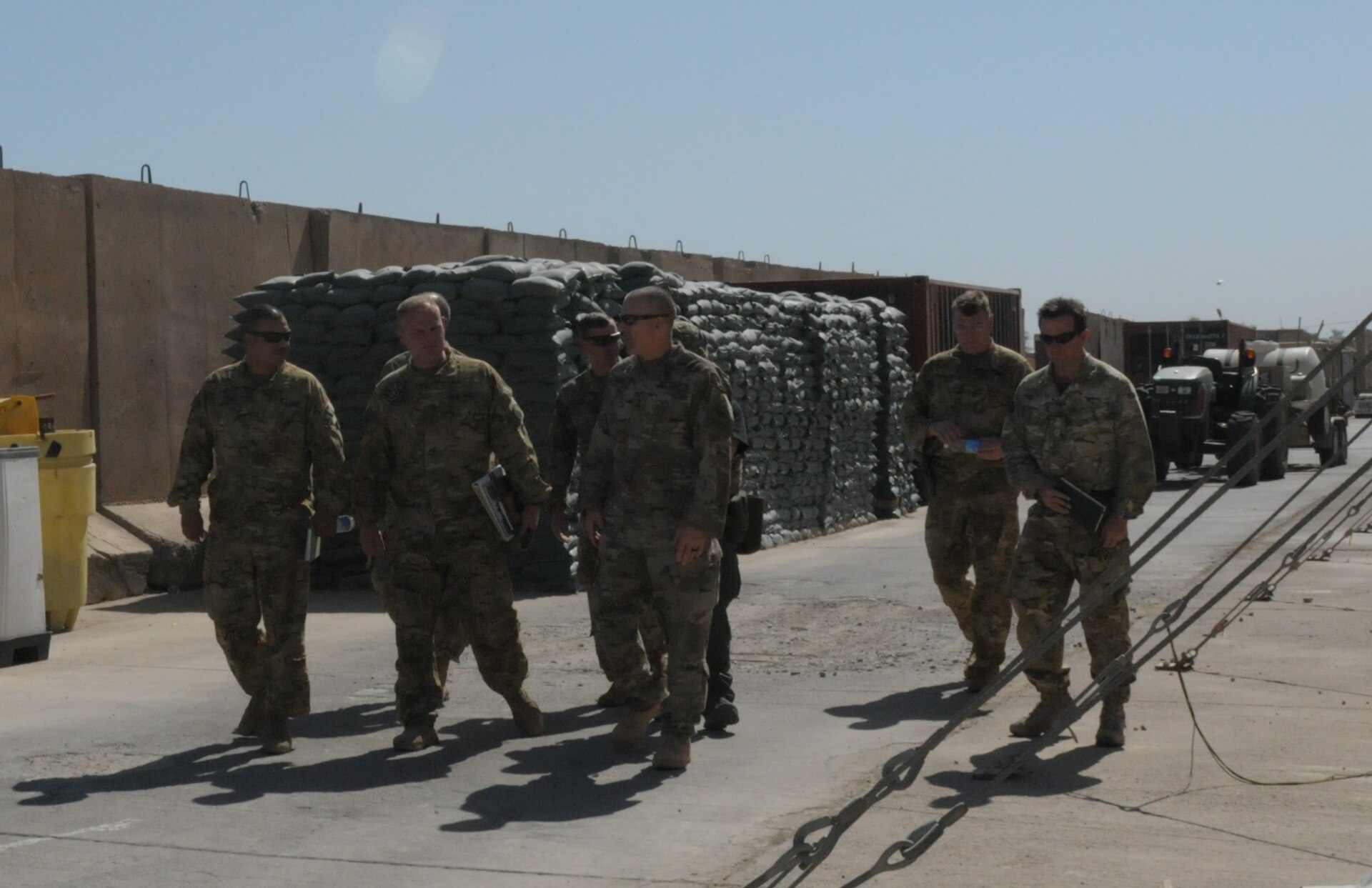 Group of Soldiers walking through the military complex.