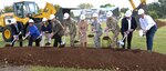 Local military and civilian leaders join Army and Air Force Exchange Service officials in breaking ground Oct. 13 for the new $54 million exchange shopping center at Joint Base San Antonio-Fort Sam Houston.