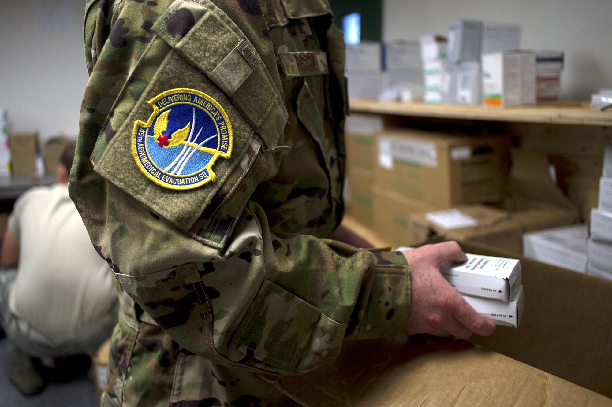U.S. Air Force Staff Sgt. Jamie Price, an aeromedical technician assigned to the 45th Aeromedical Evacuation Squadron, organizes medicine at MacDill, Air Force Base, Fla., Sept. 24, 2017.