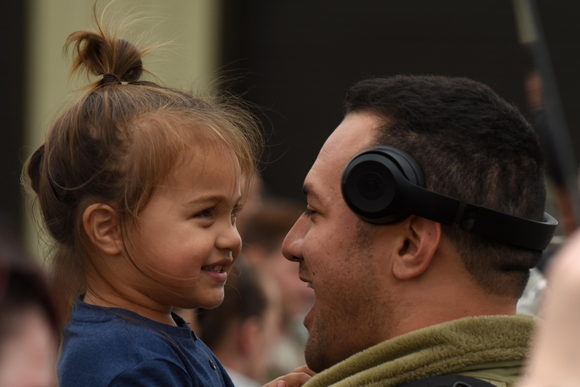 A 48th Fighter Wing Airman embraces a family member at Royal Air Force Lakenheath, England, after returning from a deployment Oct. 11. While deployed as the 492nd Expeditionary Fighter Squadron at the 332nd Air Expeditionary Wing, the 492nd FS “Bolars” completed nearly 11,000 flying hours and over 2,000 missions while delivering nearly 4,500 precision-guided munitions in support of U.S. Central Command operations. (U.S. Air Force photo/Airman 1st Class Eli Chevalier)