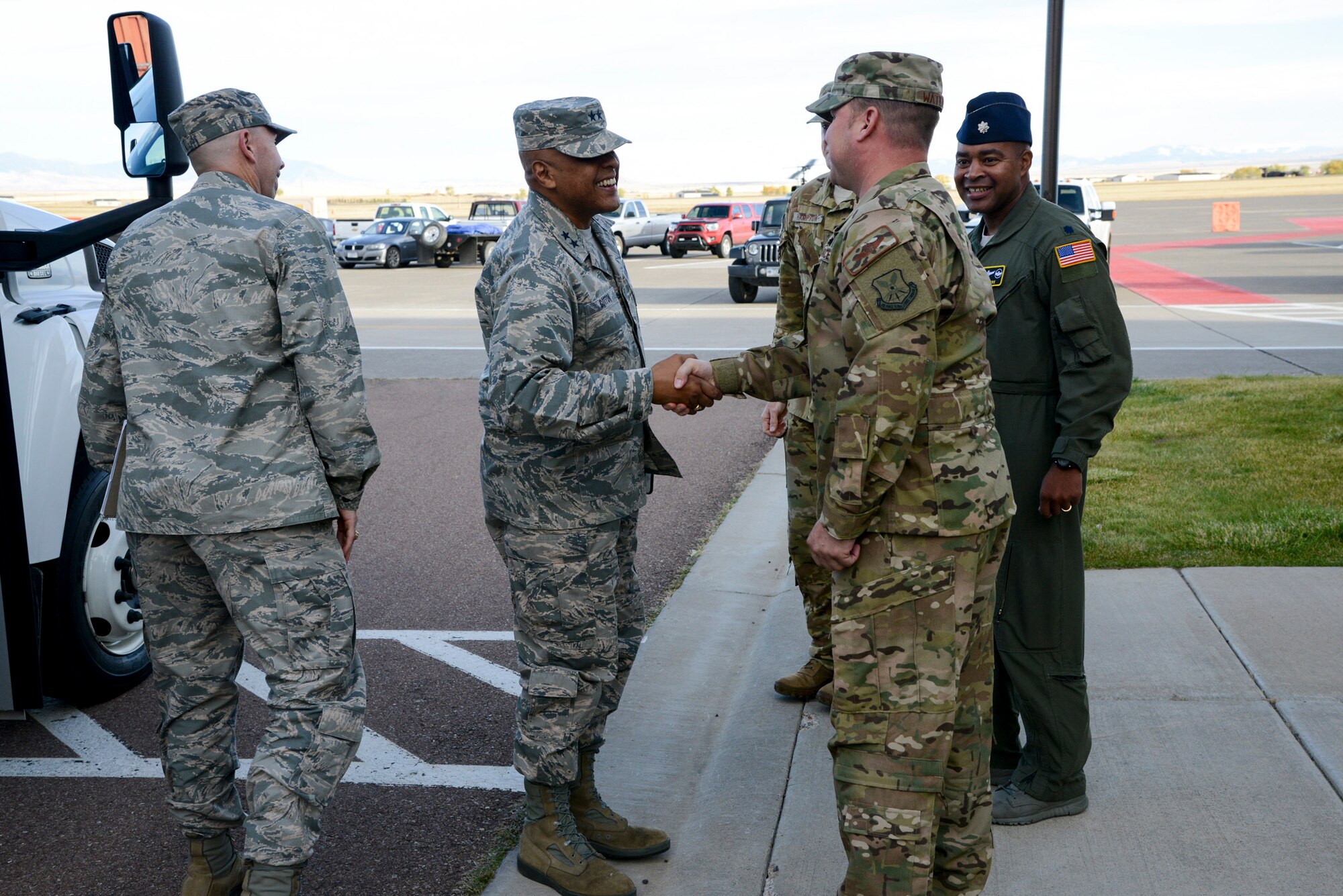 Maj. Gen. Anthony Cotton, 20th Air Force commander, shakes hands with Senior Master Sgt. Shawn Watkins, 40th Helicopter Squadron superintendent, upon his arrival to the 40th HS, Oct. 10, 2017 at Malmstrom Air Force Base, Mont.