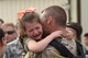 A 48th Fighter Wing Airman embraces a family member at Royal Air Force Lakenheath, England, after returning from a deployment Oct. 11. F-15E Strike Eagles and Airmen from the 492nd Fighter Squadron and supporting units across the 48th Fighter Wing returned from a six-month deployment to an undisclosed location in Southwest Asia. (U.S. Air Force photo/Airman 1st Class Eli Chevalier)