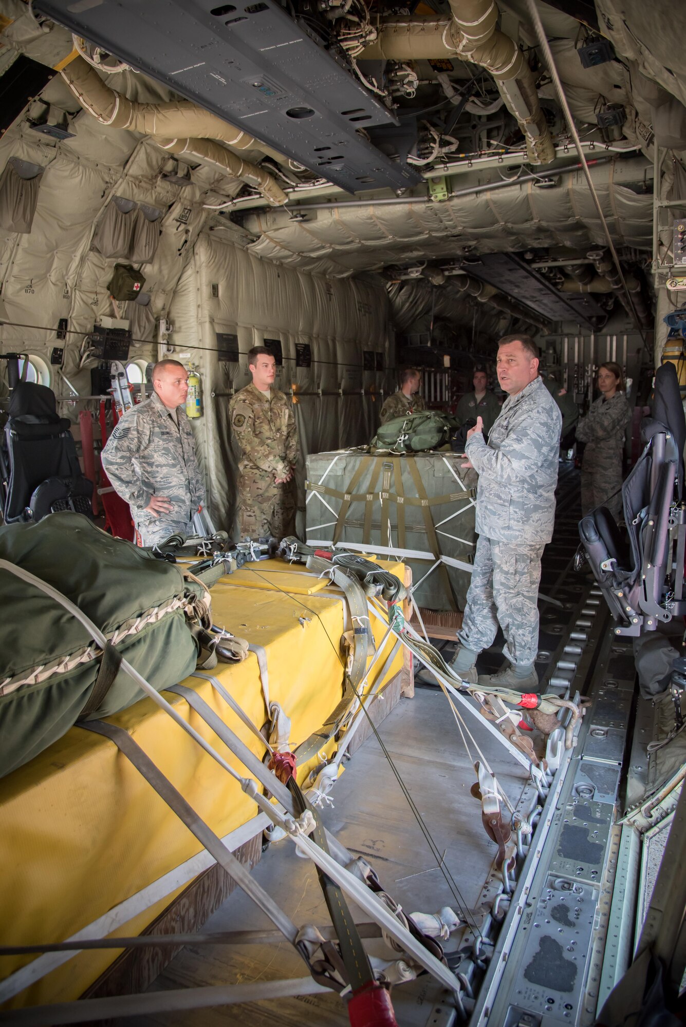 Maj. Gen. Timothy Leahy, 2nd Air Force commander, discusses the mission of the 815th Airlift Squadron and 803rd Aircraft Maintenance Squadron during his immersion tour of the 403rd Wing Oct. 13, 2017 at Keesler air Force Base, Mississippi. (U.S. Air Force photo/Staff Sgt. Heather Heiney)
