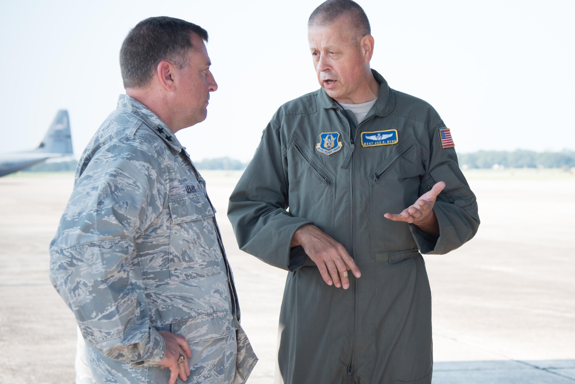 Maj. Gen. Timothy Leahy, 2nd Air Force commander, discusses the mission of the 36th Aeromedical Evacuation Squadron with Master Sgt. Joe Byrd, 36th AES aeromedical evacuation technician, during his immersion tour of the 403rd Wing Oct. 13, 2017 at Keesler air Force Base, Mississippi. (U.S. Air Force photo/Staff Sgt. Heather Heiney)