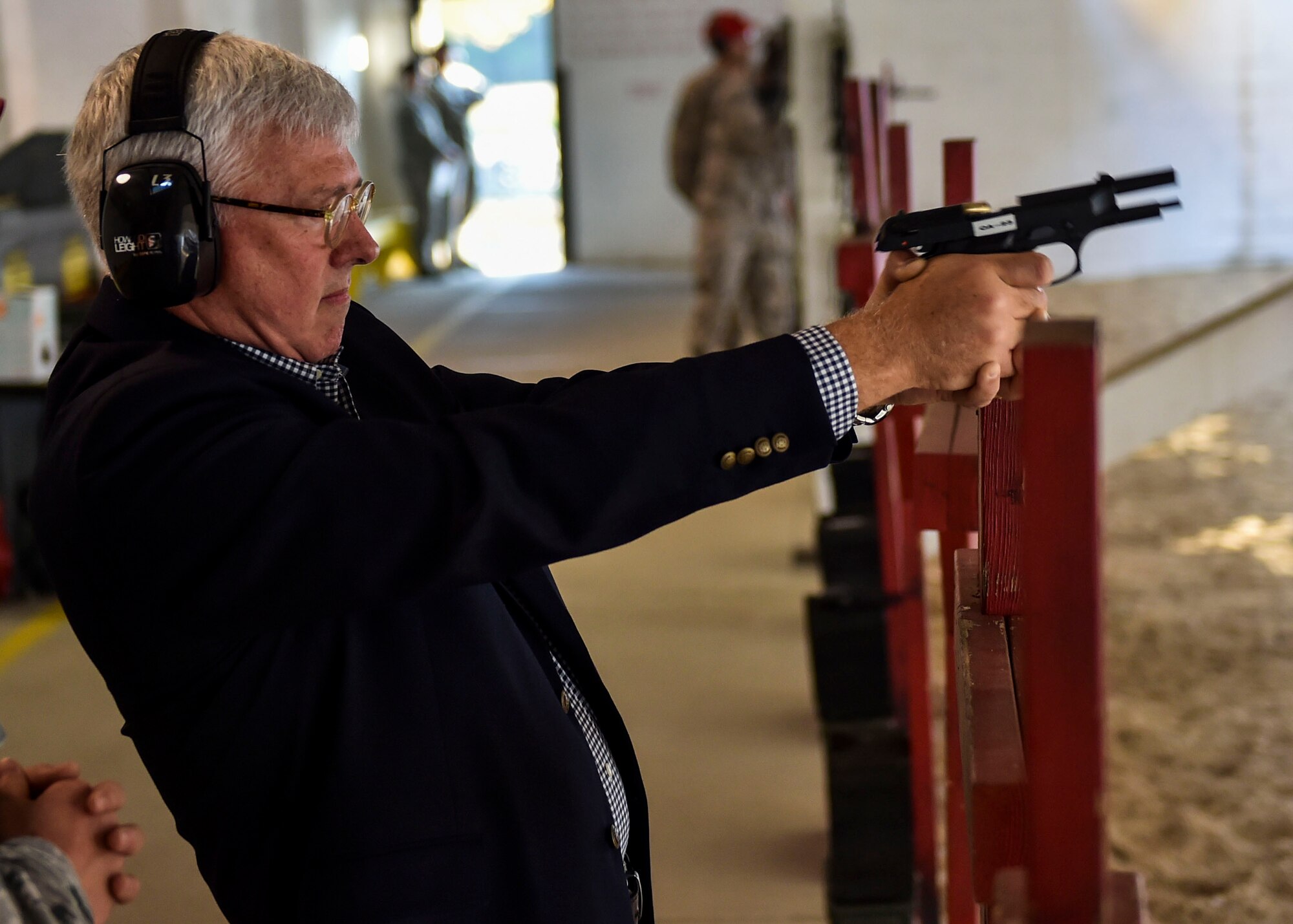 Daniel R. Sitterly, Acting Assistant Secretary of the Air Force for Manpower and Reserve Affairs, is given a firing range orientation by Combat Arms Training and Maintenance staff here, Oct.14, 2017.