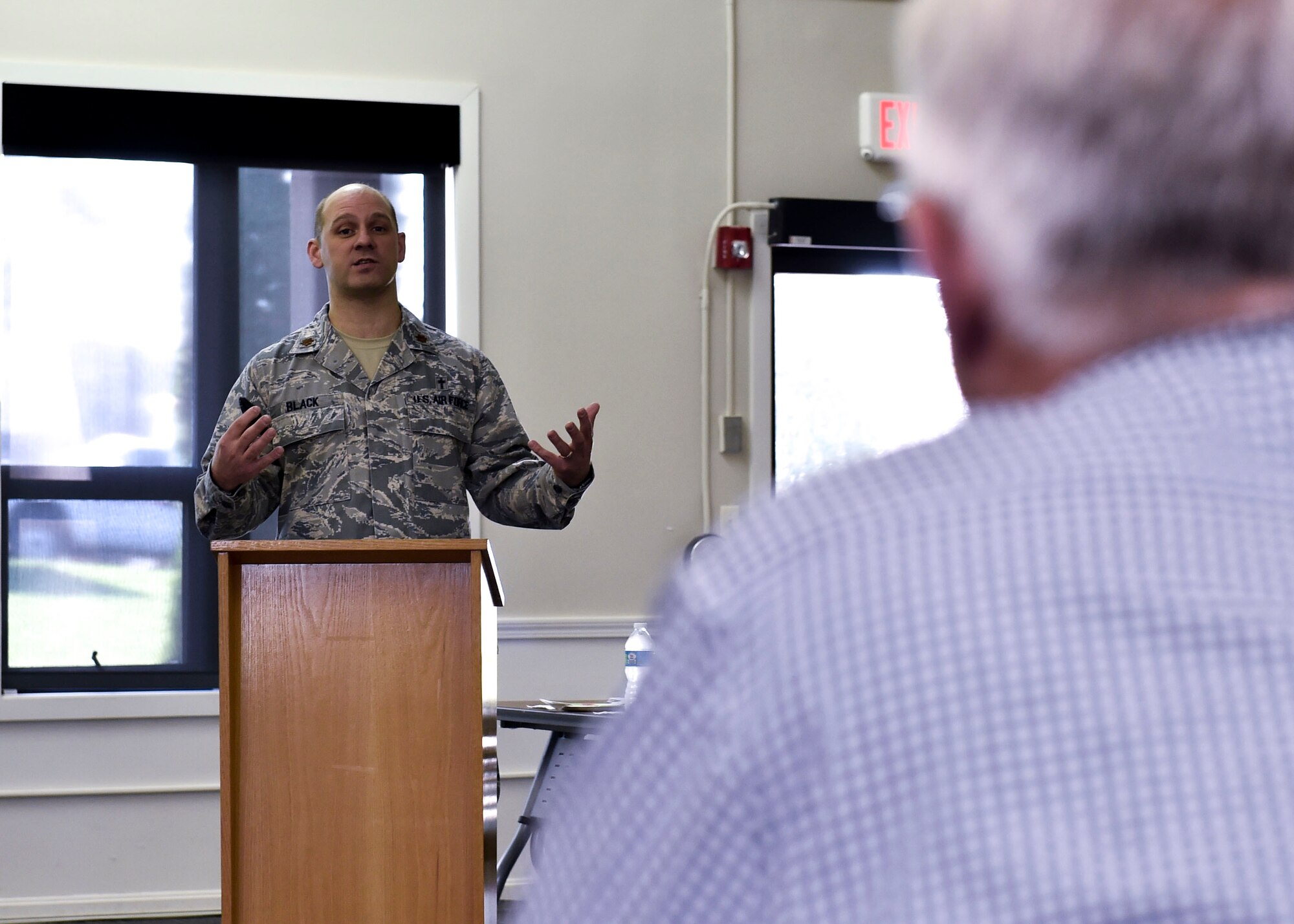 Maj. David Black, 910th Airlift Wing chaplain, briefs Daniel R. Sitterly, Acting Assistant Secretary of the Air Force (SAF) for Manpower and Reserve Affairs, on the 910th's efforts to ensure resiliency among its members, Oct. 14, 2017, here.