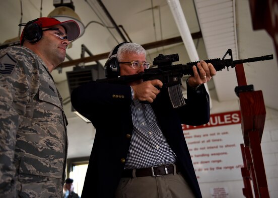 Master Sgt. Thomas Harris, the Non-Commissioned Officer in Charge of Combat Arms Training and Maintenance, calls out targets for Daniel R. Sitterly, Acting Assistant Secretary of the Air Force (SAF) for Manpower and Reserve Affairs, Oct.14, 2017, here.
