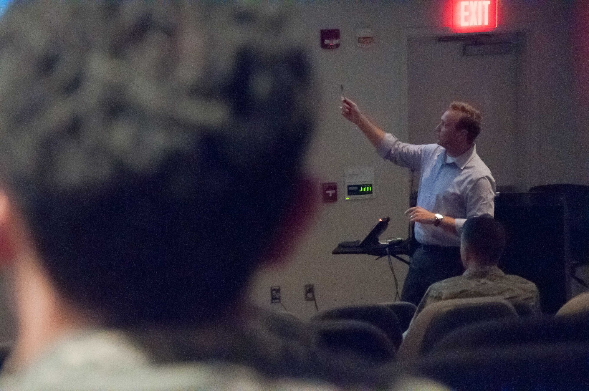 John Heaton, Neuropsychiatry Branch manager of the Aeromedical Consultation Service, briefs flight surgeon students on his branch as part of the Aerospace Medicine Primary Course. The Neuropsychiatry Branch reviews the cases of medically disqualified aviators and flight status Airmen to determine the risk involved with them returning to flight duty and whether or not to recommend a medical waiver to the waiver authority, usually a major command. (U.S. Air Force photo/John Harrington)