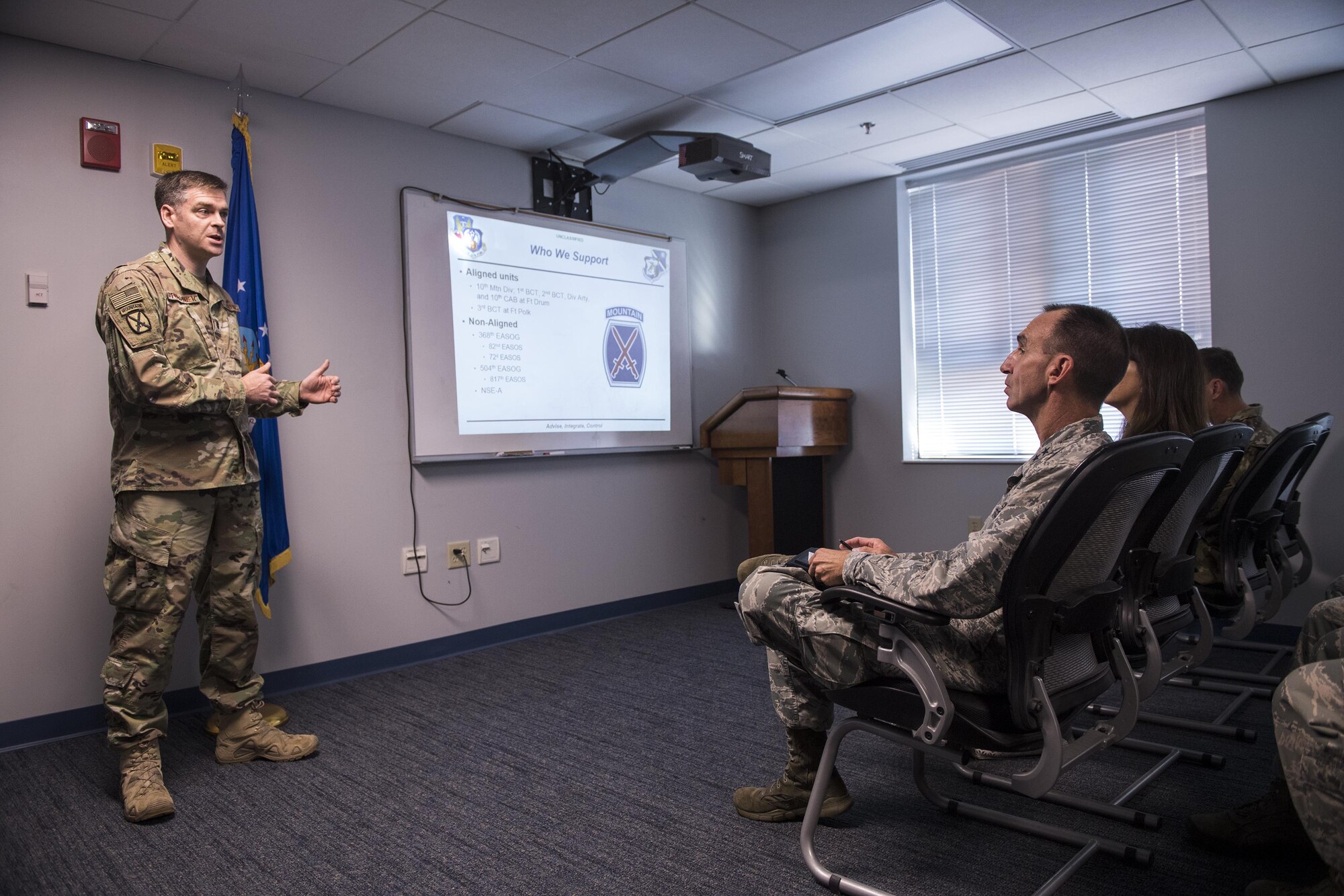 U.S. Air Force Lt. Col. Richard Fournier, 20th Air Support Operations Squadron (20th ASOS) commander, briefs Maj. Gen. Scott J. Zobrist, 9th Air Force commander, on the 20th ASOS’s mission, Oct. 10, 2017, at Fort Drum, N.Y. Airmen spoke to Zobrist about the challenges and successes they’ve had while assigned to an Air Force squadron on an Army installation, and gave him a tour of the facility. The 20th ASOS advises the U.S. Army’s 10th Mountain Division (Light Infantry) on all aspects of air operations on the battlefield and integrate airpower into the Army scheme of maneuver. (U.S. Air Force photo by Senior Airman Janiqua P. Robinson)