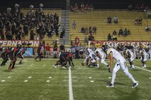 Players from Valdosta State University and Mississippi College line up on defense during a military appreciation day football game, Oct. 15, 2017, in Valdosta, Ga. Active-duty and retired military members received free admission into the game as appreciation for their service. (U.S. Air Force photo by Airman Eugene Oliver)