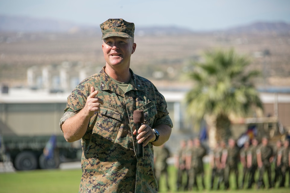 Lt. Col. Michael Cable, commanding officer, Headquarters Battalion,  addresses the crowd  during the retirement ceremony for Sgt. Maj. Avery Crespinformer Headquarters Battalion sergeant major,  at Lance Cpl. Torrey L. Gray field aboard the Combat Center, September 29, 2017. Crespin served in more than five units and Military Occupational Specialties in his 22 years of active duty service. (U.S. Marine Corps photo by Lance Cpl. Isaac Cantrell)