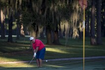 Retired Master Sgt. Bill Herbert, chips a golf ball during a Retiree Appreciation Week golf tournament, Oct. 13, 2017, at the Quiet Pines golf course on Moody Air Force Base, Ga. Retired Chief Master Sgt. James Ingram, director of the Retiree Affairs Office, created the annual event in the 1990’s to bring retirees together and make them feel welcomed in the base community. (U.S. Air Force photo by Senior Airman Daniel Snider)