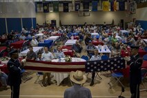 Members of the 23d Wing Honor Guard conduct a flag folding ceremony, during a Retiree Appreciation Week event, at the Freedom 1 Fitness Center on Moody Air Force Base, Ga. Retired Chief Master Sgt. James Ingram, director of the Retiree Affairs Office, created the annual event in the 1990’s to bring retirees together and make them feel welcomed in the base community. (U.S. Air Force photo by Senior Airman Daniel Snider)