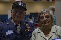 Retired Chief Master Sgt. Jim Herring and his spouse, Elizabeth, pose during a Retiree Appreciation Week event, at the Freedom 1 Fitness Center on Moody Air Force Base, Ga. Retired Chief Master Sgt. James Ingram, director of the Retiree Affairs Office, created the annual event in the 1990’s to bring retirees together and make them feel welcomed in the base community. (U.S. Air Force photo by Senior Airman Daniel Snider)