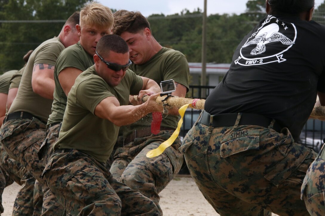 Marines assigned to 2nd Low Altitude Air Defense Battalion compete during the 2017 Combined Federal Campaign Tug-of-War Tournament at Marine Corps Air Station Cherry Point, N.C., Oct. 13, 2017. The mission of the CFC is to promote and support philanthropy through a program that is employee focused, cost-efficient, and effective in providing all federal employees the opportunity to improve the quality of life for others. 2nd LAAD Bn. is assigned to Marine Air Control Group 28, 2nd Marine Aircraft Wing. (U.S. Marine Corps photo by Cpl. Jason Jimenez/Released)