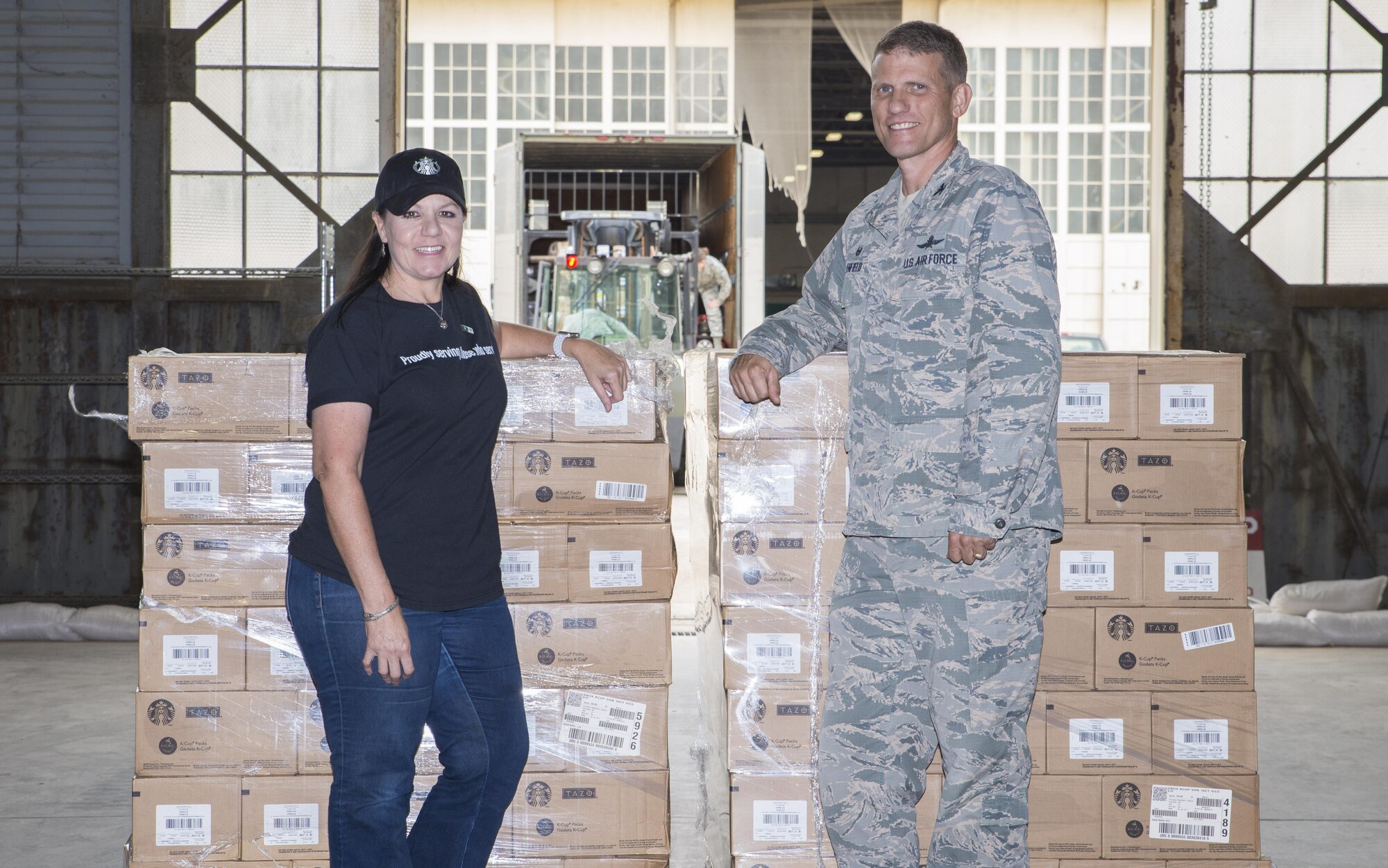 433rd Airlift Wing members seperate flavors of coffee from one of 7 pallets that were donatd to the Alamo Wing,  October 10, 2017 at Joint Base San Antonio-Lackland, Texas.