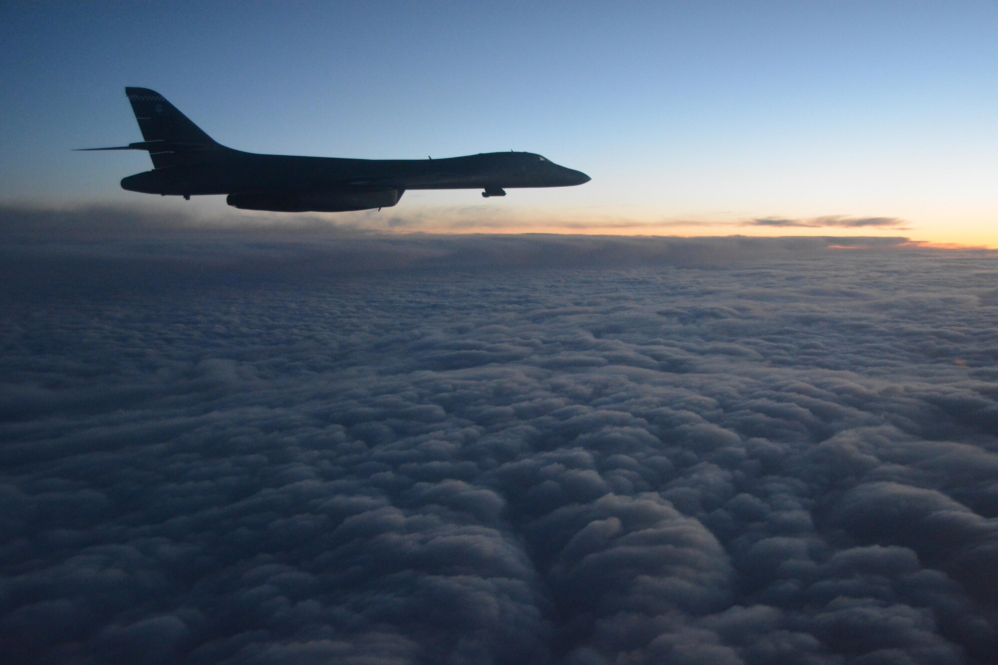 U.S. Air Force B-1B Lancer assigned to the 28th Bomb Squadron at Dyess Air Force Base, Texas, flies over the North Atlantic Ocean, Oct. 10, 2017. U.S. Strategic Command bomber forces regularly conduct combined theater security engagements with allies and partners, demonstrating the U.S. capability to command, control and conduct bomber missions across the globe. (Courtesy photo)