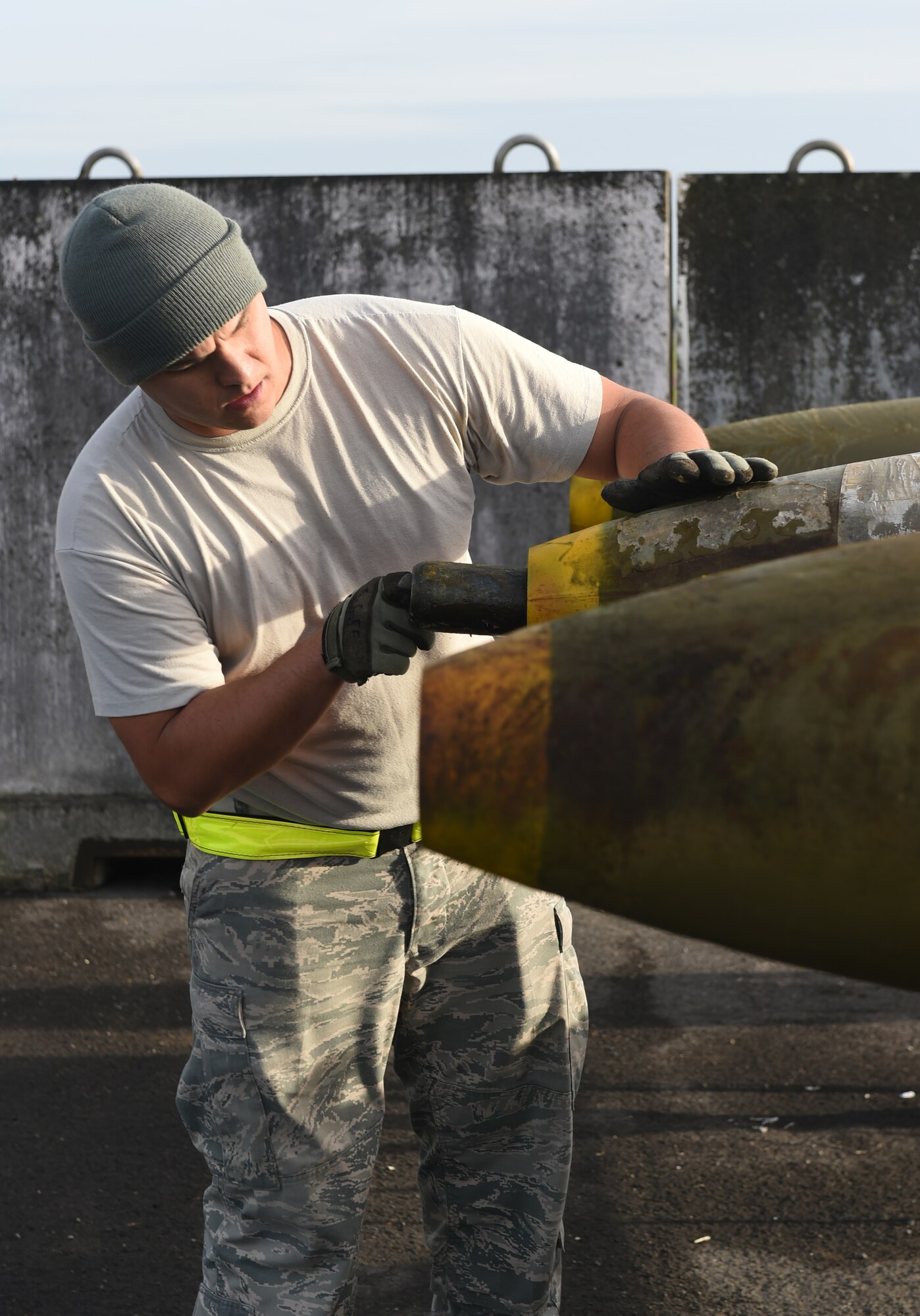 U.S. Air Force Master Sgt. Jason Lee, 7th Munitions Squadron munitions specialist, inserts a nose plug to the tip of a guided bomb unit at RAF Fairford, U.K., Oct. 12, 2017. The 7th MUNS plays a key role in B-1B Lancer training and mission readiness by storing, maintaining and delivering quality munitions, and maintaining munitions release system. (U.S. Air Force photo by Airman 1st Class Emily Copeland)