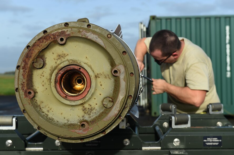 U.S. Air Force Senior Airman Collin Henrise, 7th Munitions Squadron munitions specialist tightens a bolt on the guided bomb unit at RAF Fairford, U.K., Oct. 12, 2017. The 7th Bomb Wing deployed to RAF Fairford to take part in various exercises and training in Europe as part of the U.S. Air Forces in Europe’s forward operating mission for bombers. (U.S. Air Force photo by Airman 1st Class Emily Copeland)