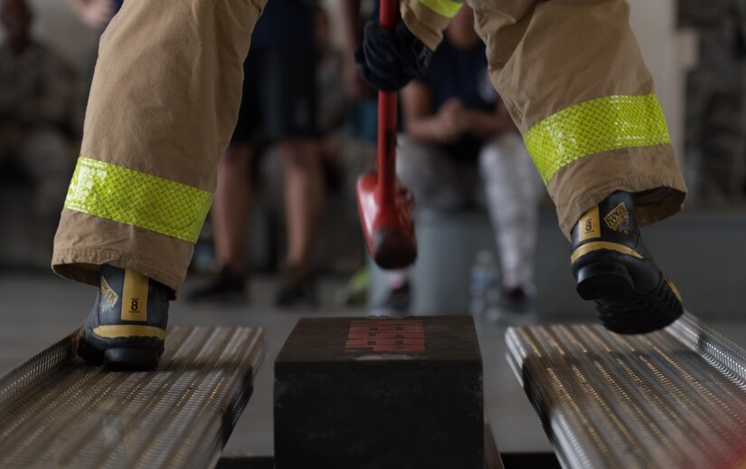 A participant competes in the Keiser Sled move obstacle during the Firefighter Combat Challenge at Joint Base Langley-Eustis, Va., Oct. 13, 2017.