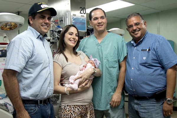 Puerto Rico Gov. Ricardo Rosello, left, visits the USNS Comfort after a baby was born aboard the ship, Oct. 15, 2017. Sara Victoria was the first baby born aboard that ship in more than seven years. Comfort is in the vicinity of San Juan and will be traveling around the island to assist Puerto Rico in the recovery process during the aftermath of Hurricane Maria. Army photo by Sgt. Maricris C. McLane
