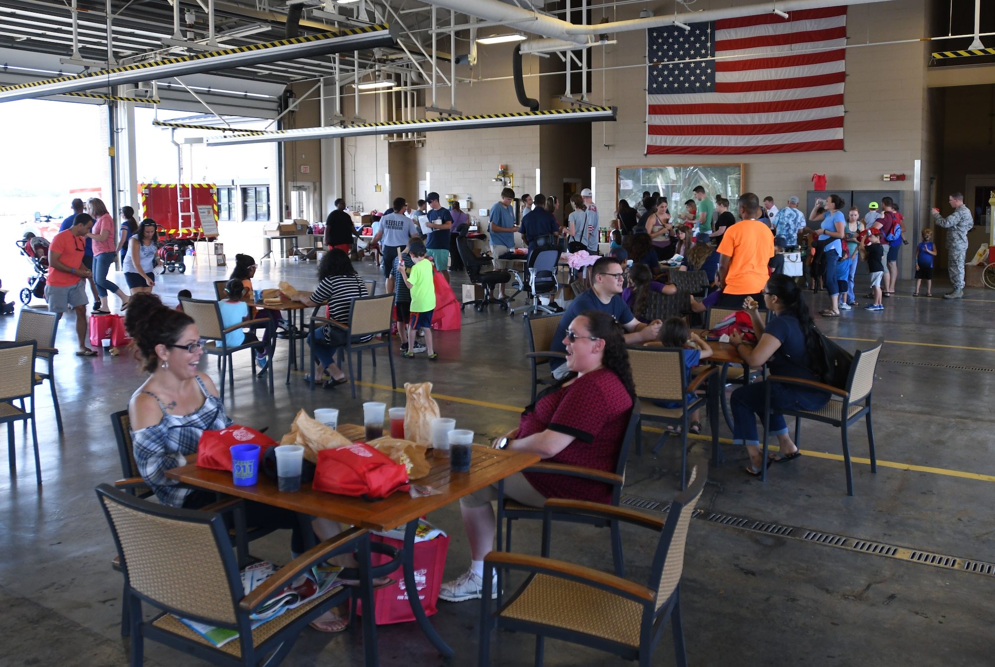 Keesler families attend the Keesler Fire Department open house at the fire station Oct. 14, 2017, on Keesler Air Force Base, Mississippi. The open house was the concluding event to Fire Prevention Week. Throughout the week the Keesler Fire Department conducted random fire drills, toured various facilities with Sparky the Fire Dog, passed out fire safety information and fire hats for children and provided stove and fire extinguisher demonstrations. (U.S. Air Force photo by Kemberly Groue)