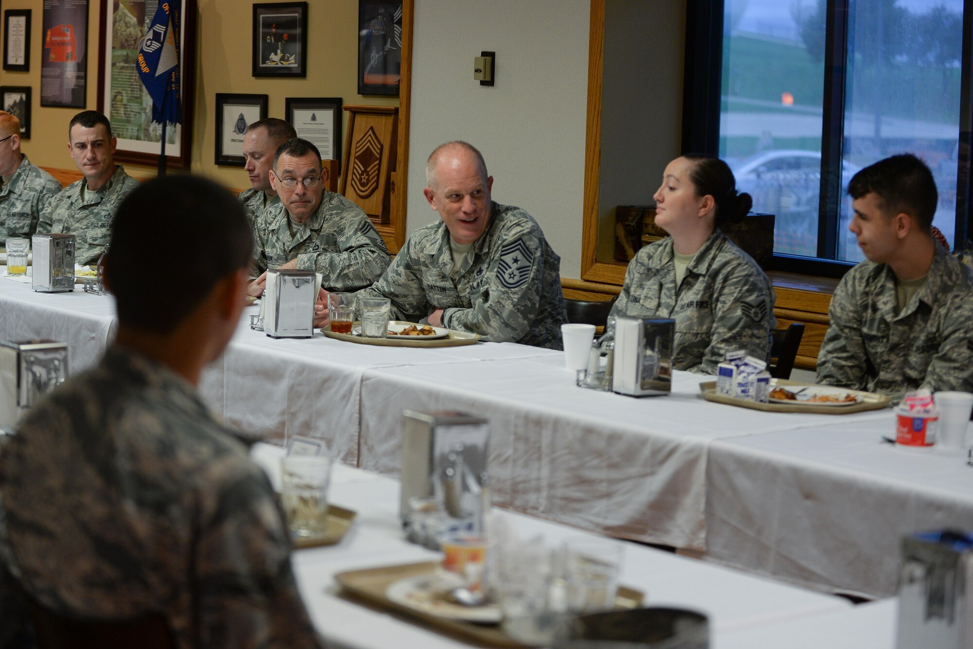 Chief Master Sgt. Frank Batten III, Air Combat Command's command chief, speaks with Airmen from the 557th Weather Wing at the King Dining Facility at Offutt Air Force Base, Oct. 4, 2017. Batten came to Offutt to see and experience all the base had to offer, and to meet the Airmen that drive the mission.